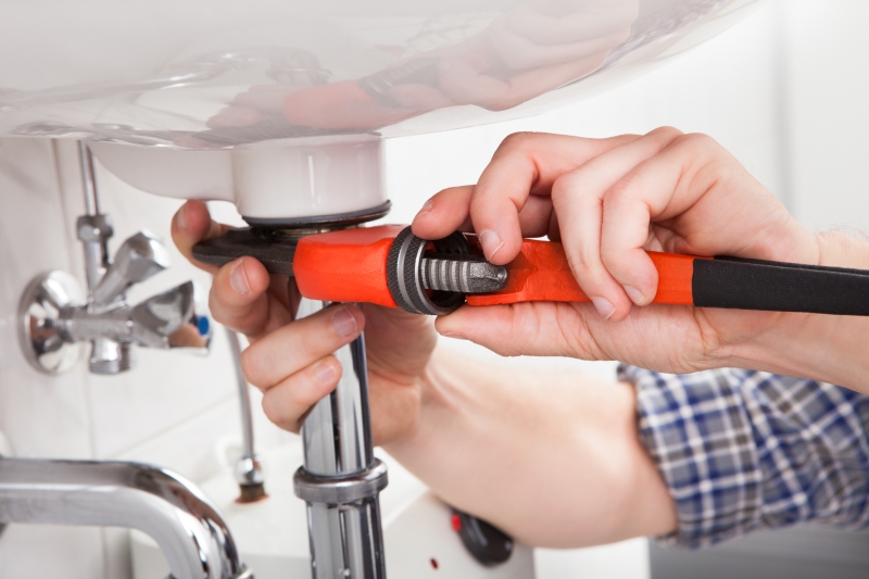 Emergency plumber attending a job in Thames Ditton